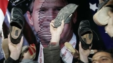 Iraqi journalist who threw shoes at President George W Bush faces trial on February 19