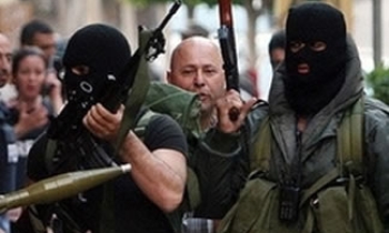 Hezbollah forces shut down pro-govt TV in Lebanon, newspaper office set ablaze