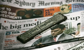 As slowdown goes Down Under, heads begin to roll in Australian newspaper industry