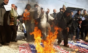 Shoe-throwing Iraqi journalist had been tortured for 'apology' to President Bush, says family