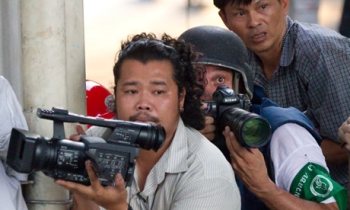 Journalists playing with death while shooting political unrest in Thailand